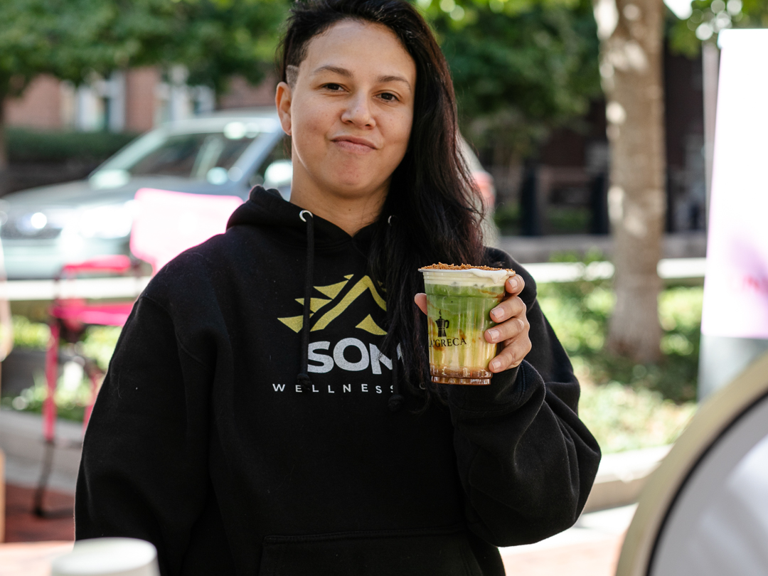 A guest holding a La’Greca matcha at SOMA